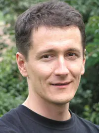 A person in a black shirt

Description automatically generated